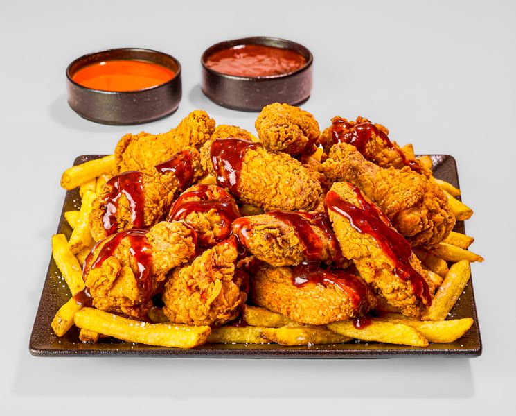 Hangry Joe's kitchen team preparing fresh hot chicken in Philadelphia